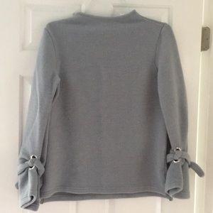 Blue fleece sweater.
